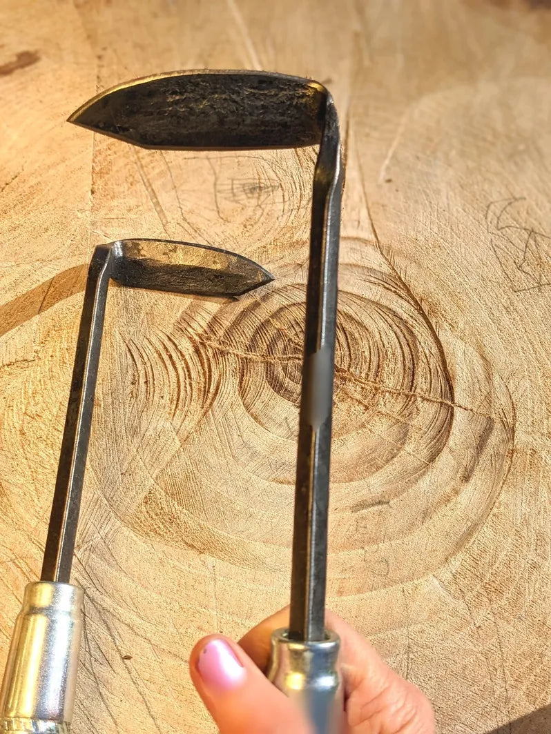 Cape Cod Weeder, right or left handed by Homestead Iron on wooden background. 